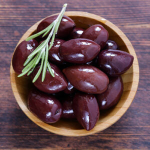 Greek Kalamata Olive Oil bottle with Kalamata olives and bread dipping bowl